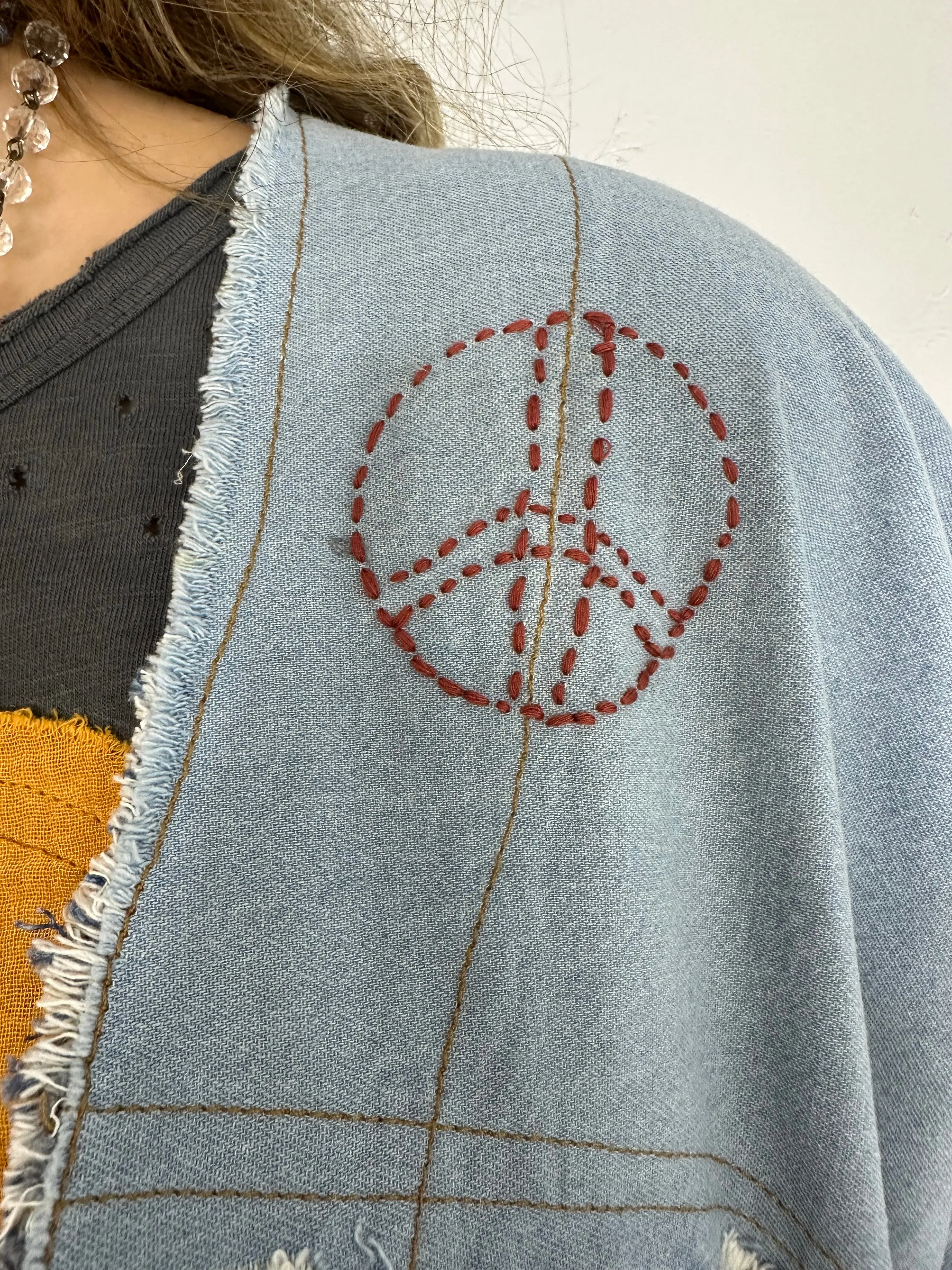 Patchwork Distressed Denim Jacket with Stars and Pockets